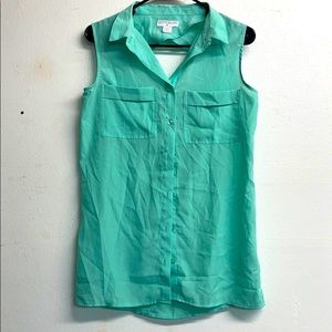 Back cut out sleeveless blouse